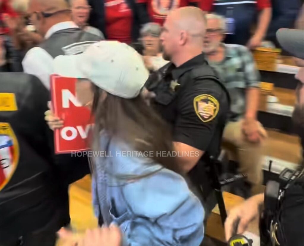 A PR-24 can be seen on this Ross County deputy’s duty belt as a protester is removed