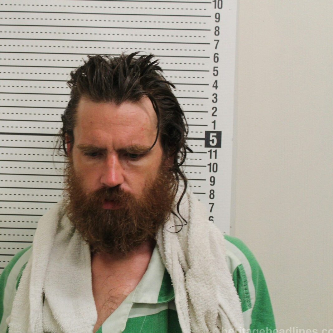 Barred From the Property Since 2024, Man Arrested in Warner Avenue Backyard