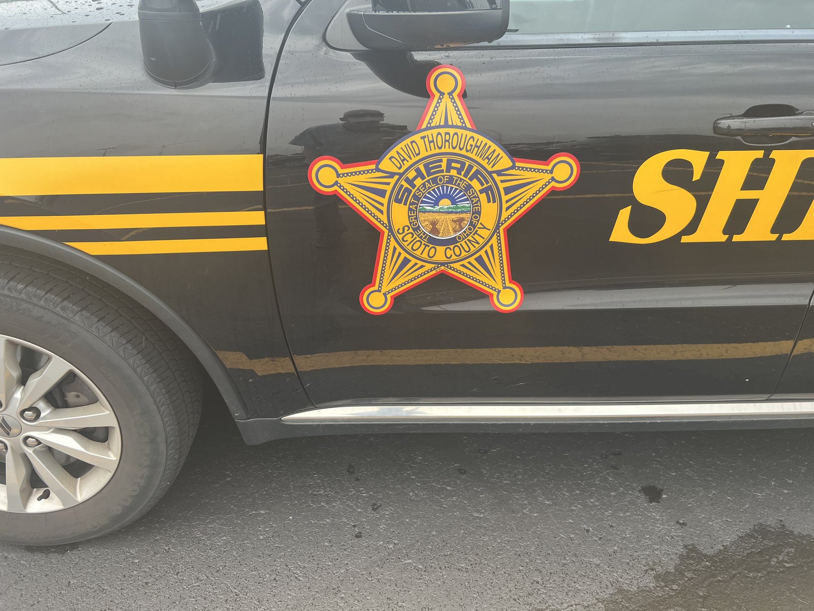 The sheriff's star on the door of a Scioto County Sheriff's Office cruiser.