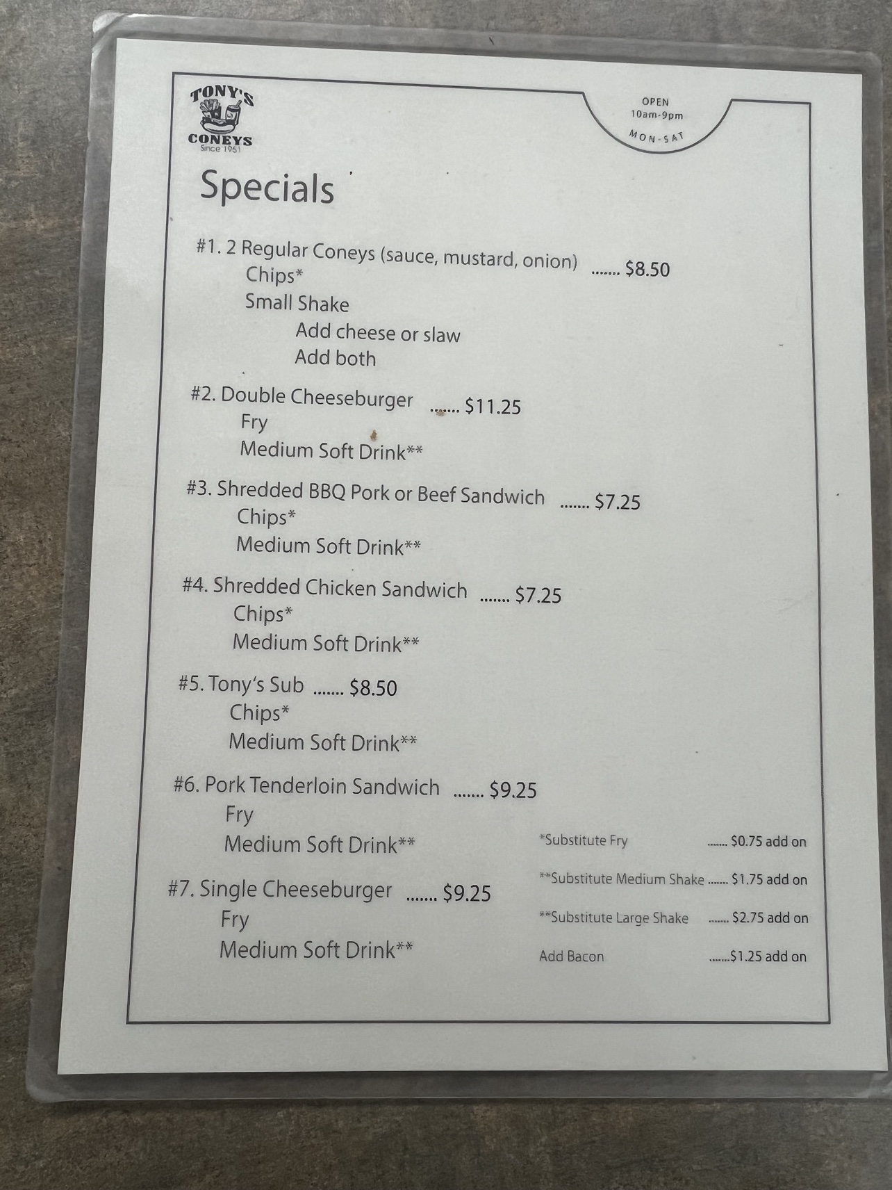 Specials board at Tony's Coney's with combo meals and prices