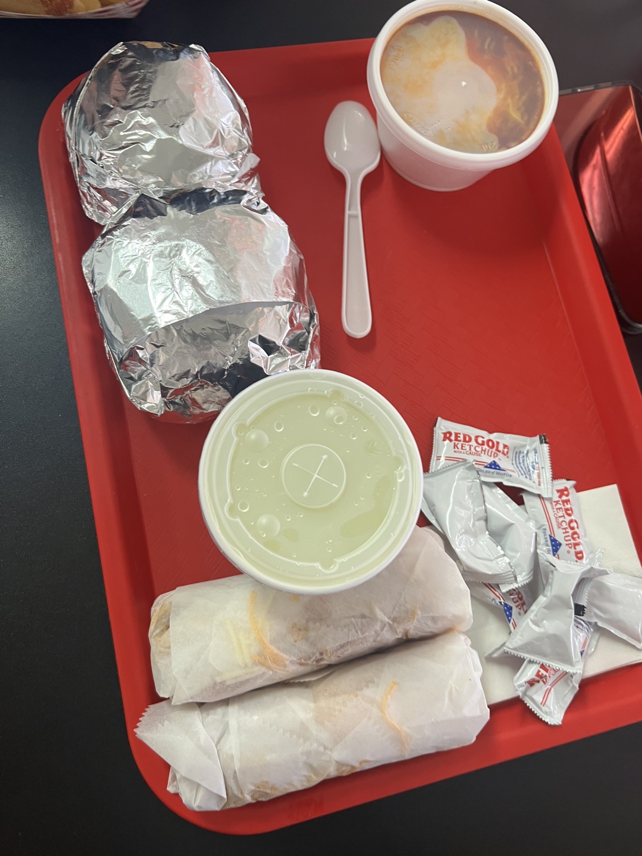 Tray of food from Tony's Coney's with coneys burger and chili