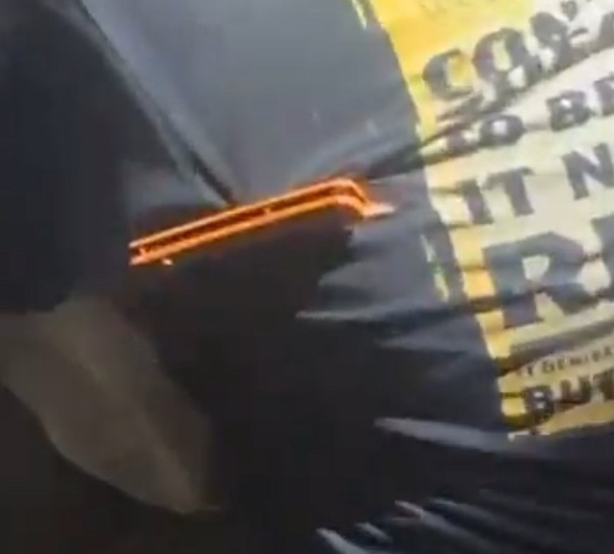The orange-handled pocketknife belonging to an officer, caught on a man’s shirt during the fight. Police say the knife never opened.