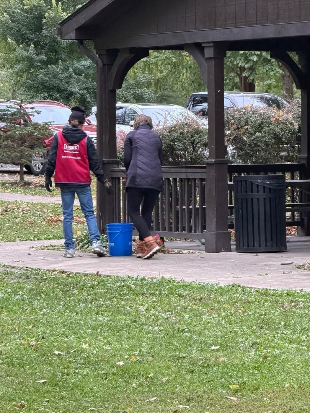 Volunteers clean around the Yoctangee Park gazebo